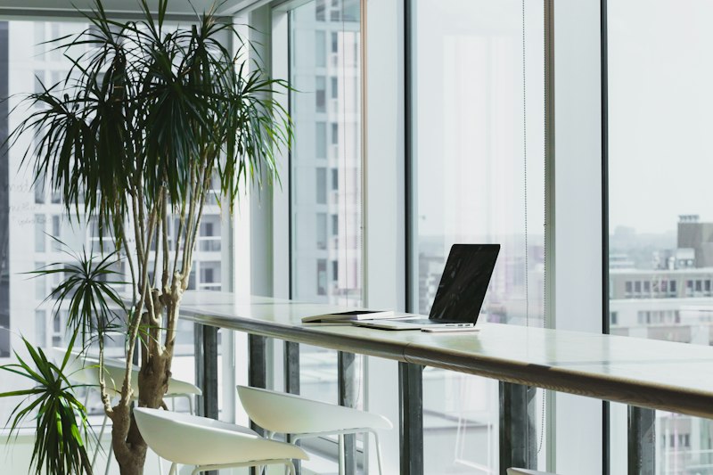 Executive assistant workspace with clean desk and laptop